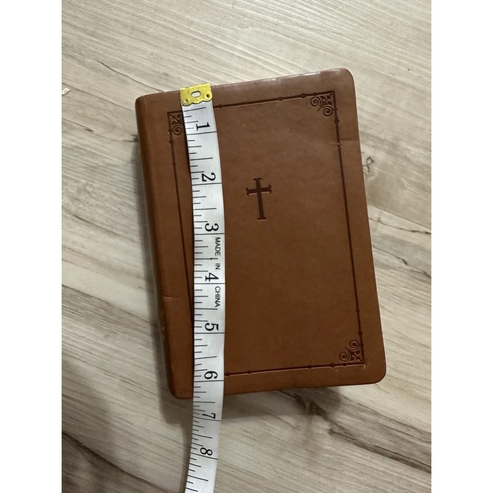 Zondervan NIV Trimline‎ Bible with a brown Italian Leather Duo-Tone cover
